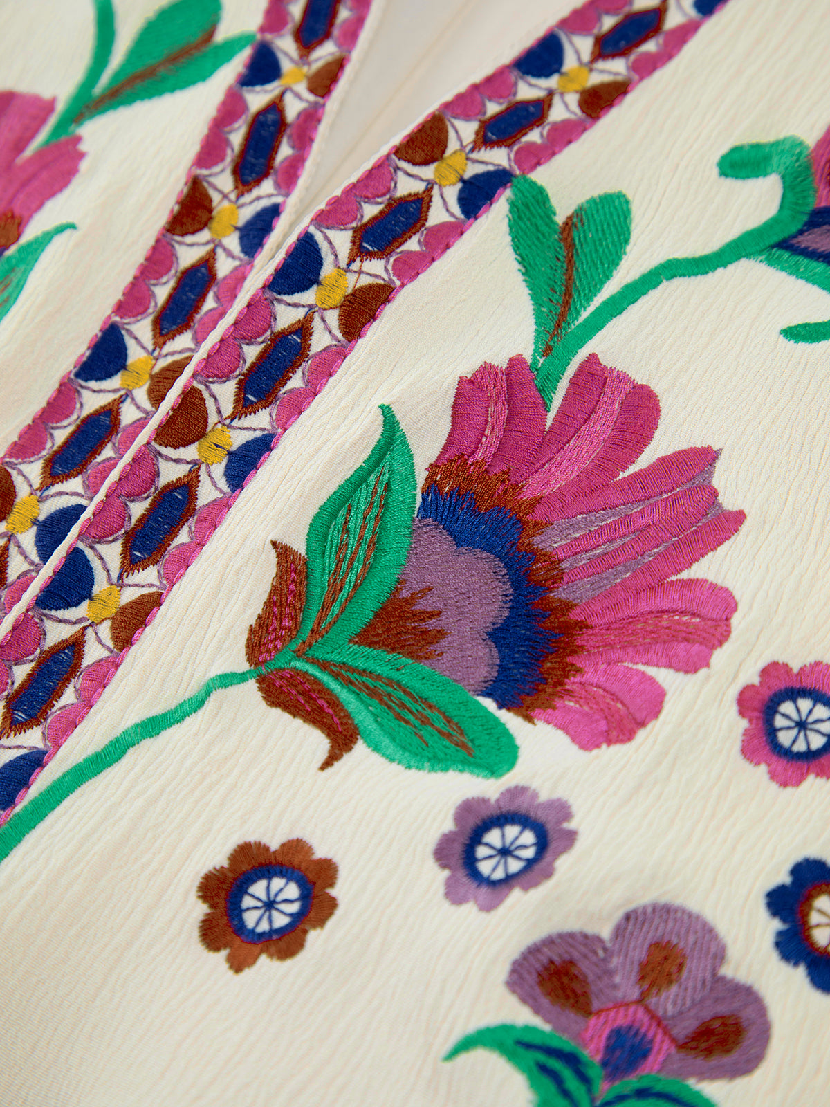 Broderad blommig väst