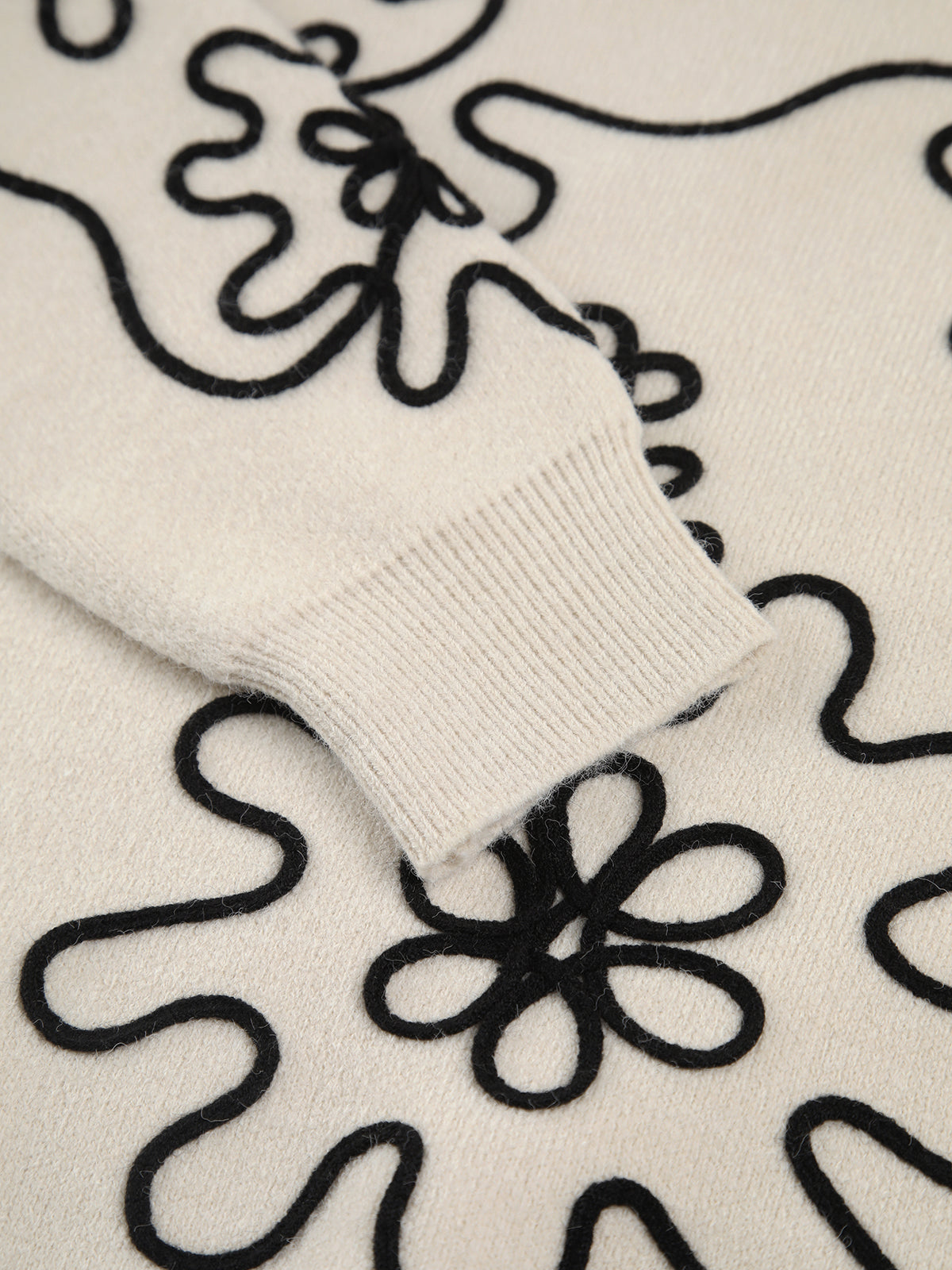 Stickad blommig oversized tröja