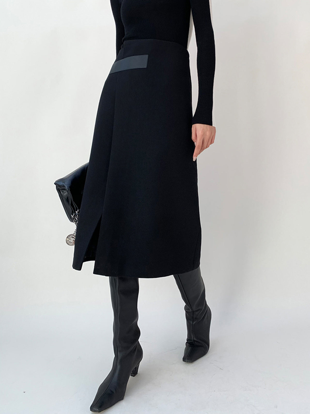 Asymmetrisk midikjol i tweed med hög midja