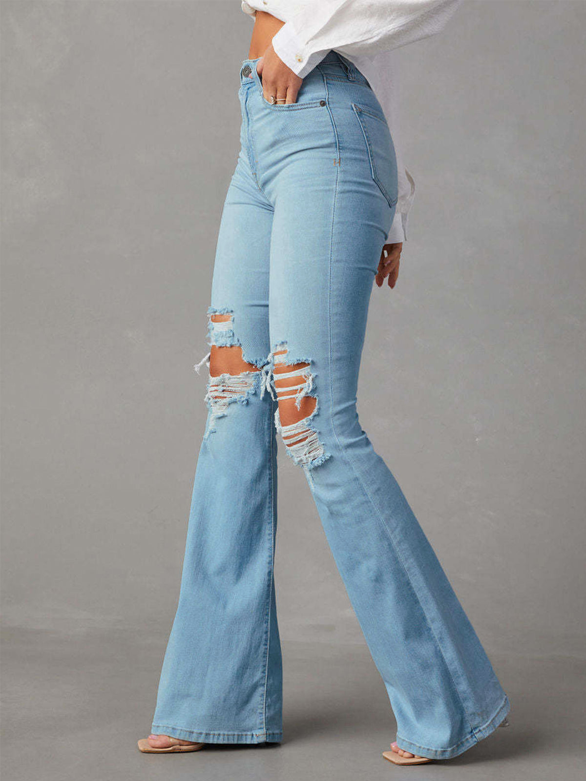 Slitna denim utsvängda jeans