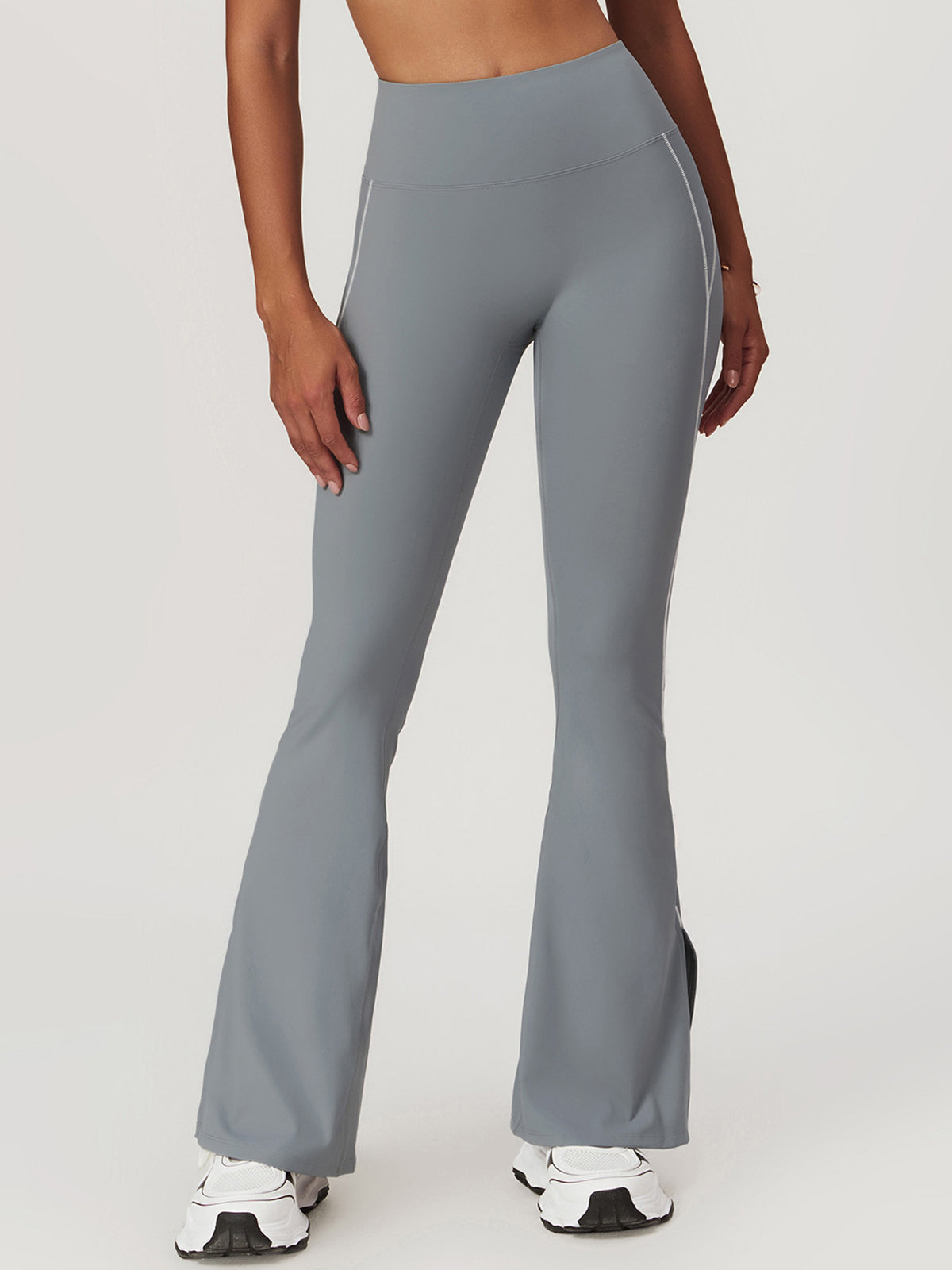 Högmidjade höftlyftande utsvängda leggings