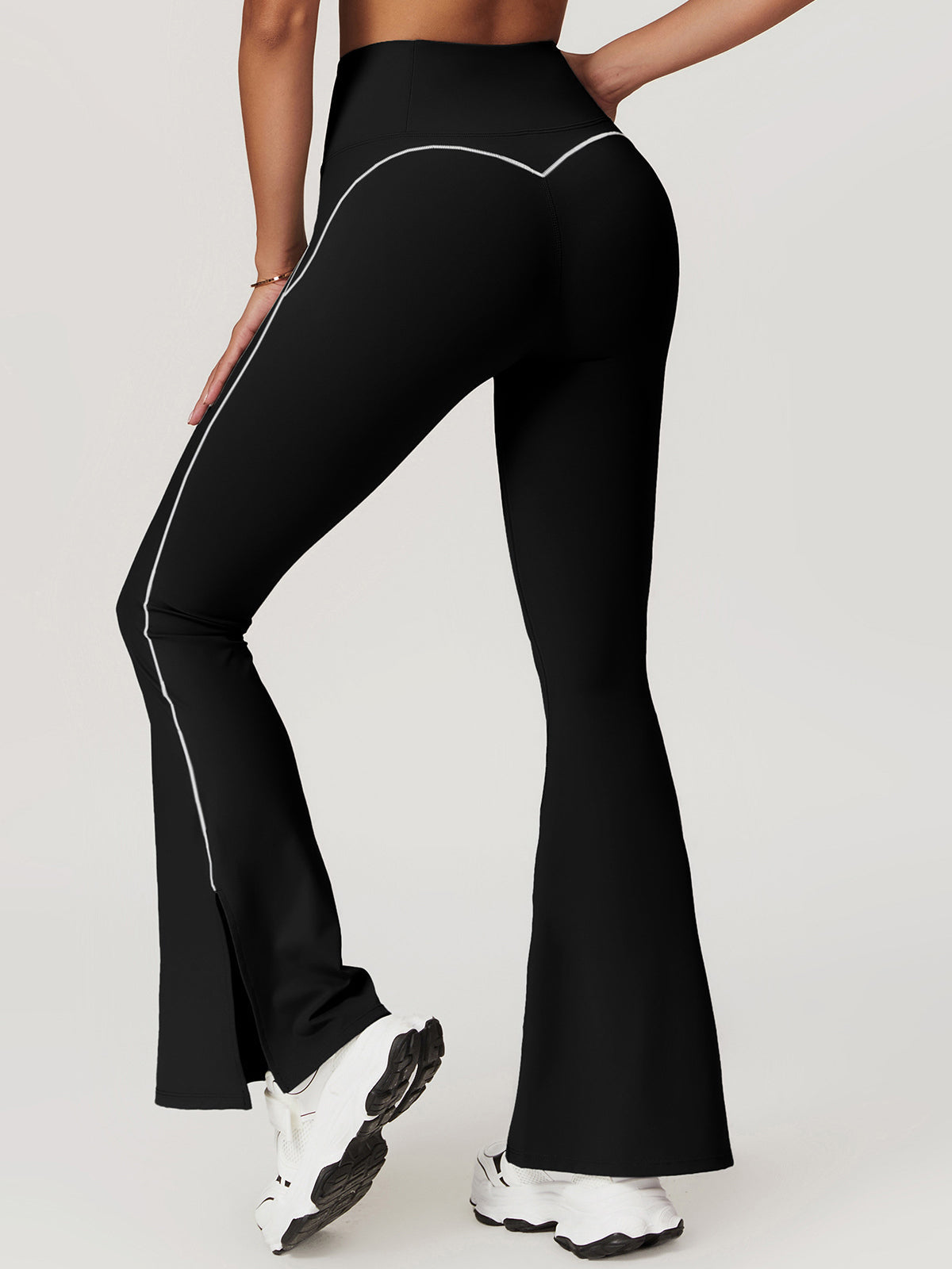 Högmidjade höftlyftande utsvängda leggings