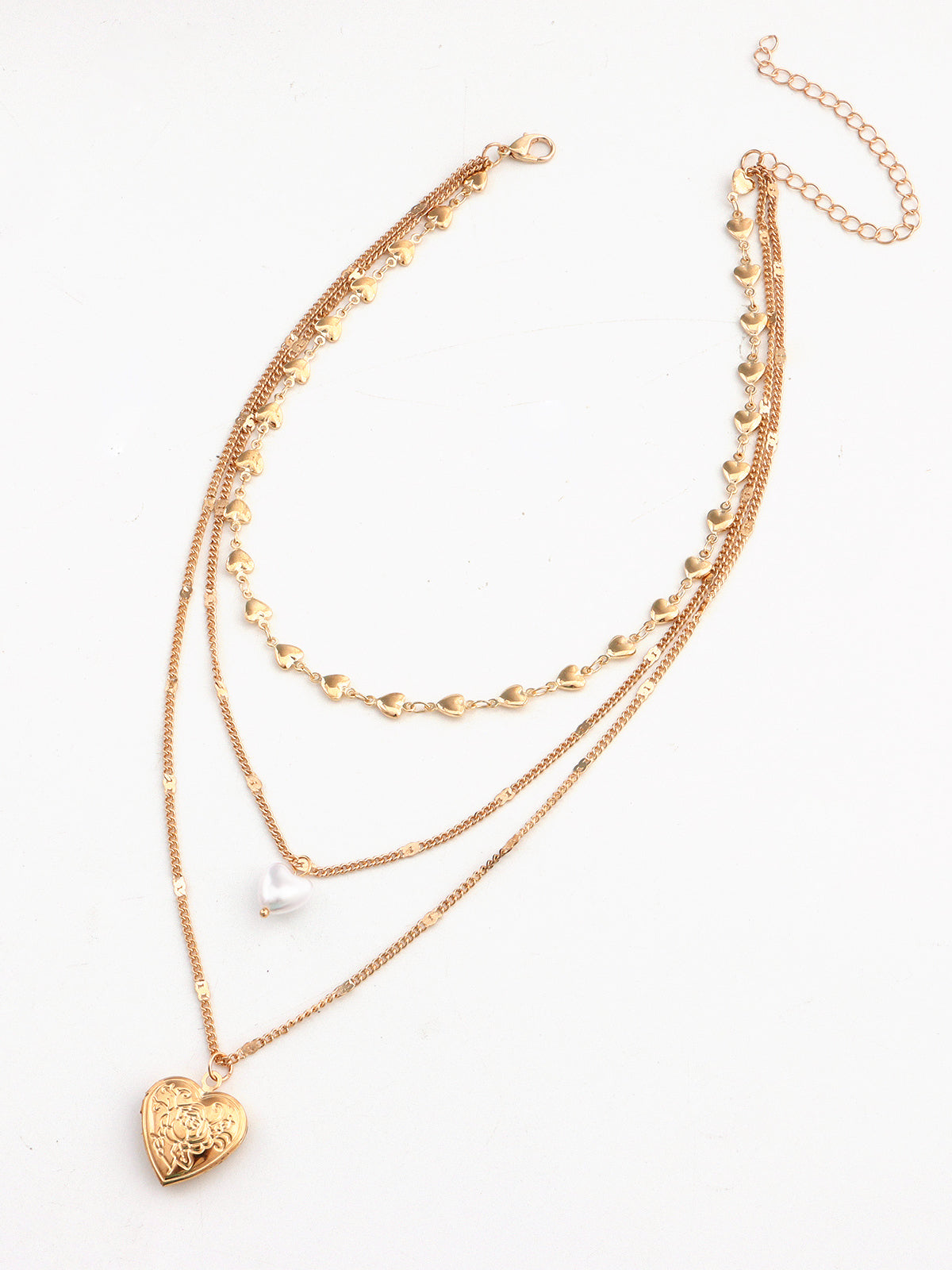Halsband med hjärtformad charm i tre lager
