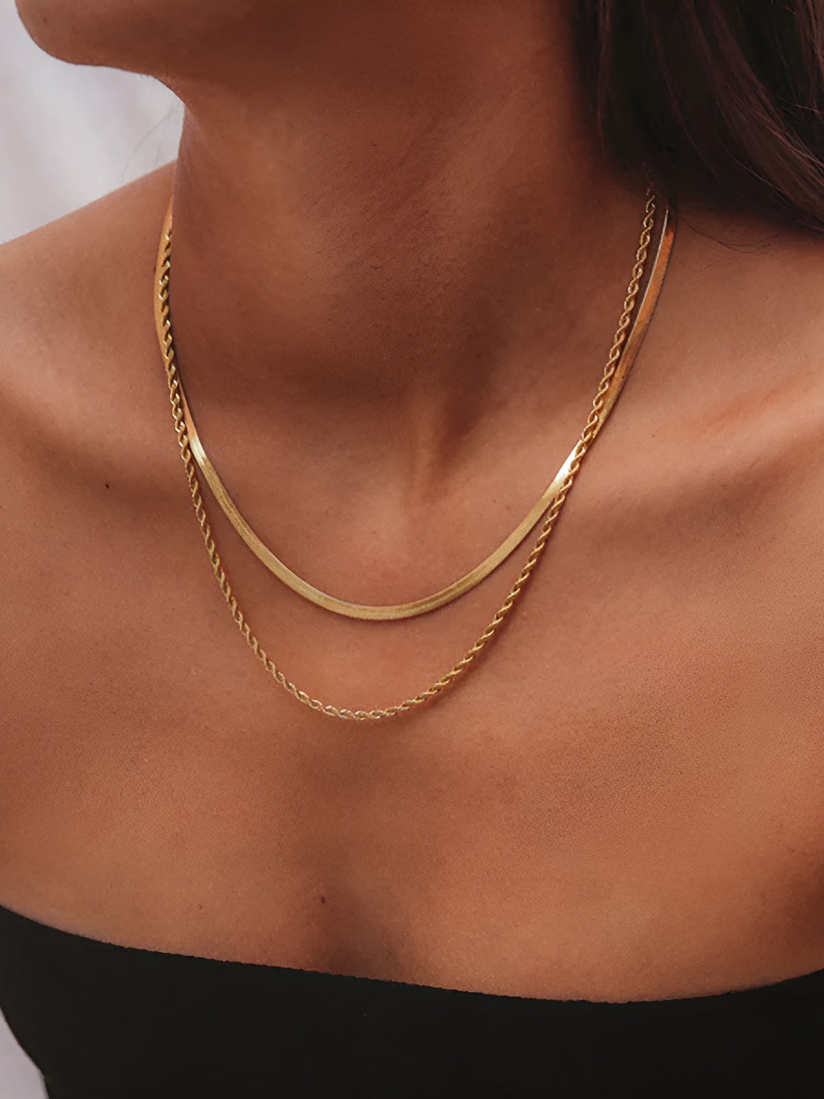 Halsband med dubbla lager av orm- och twistkedjor