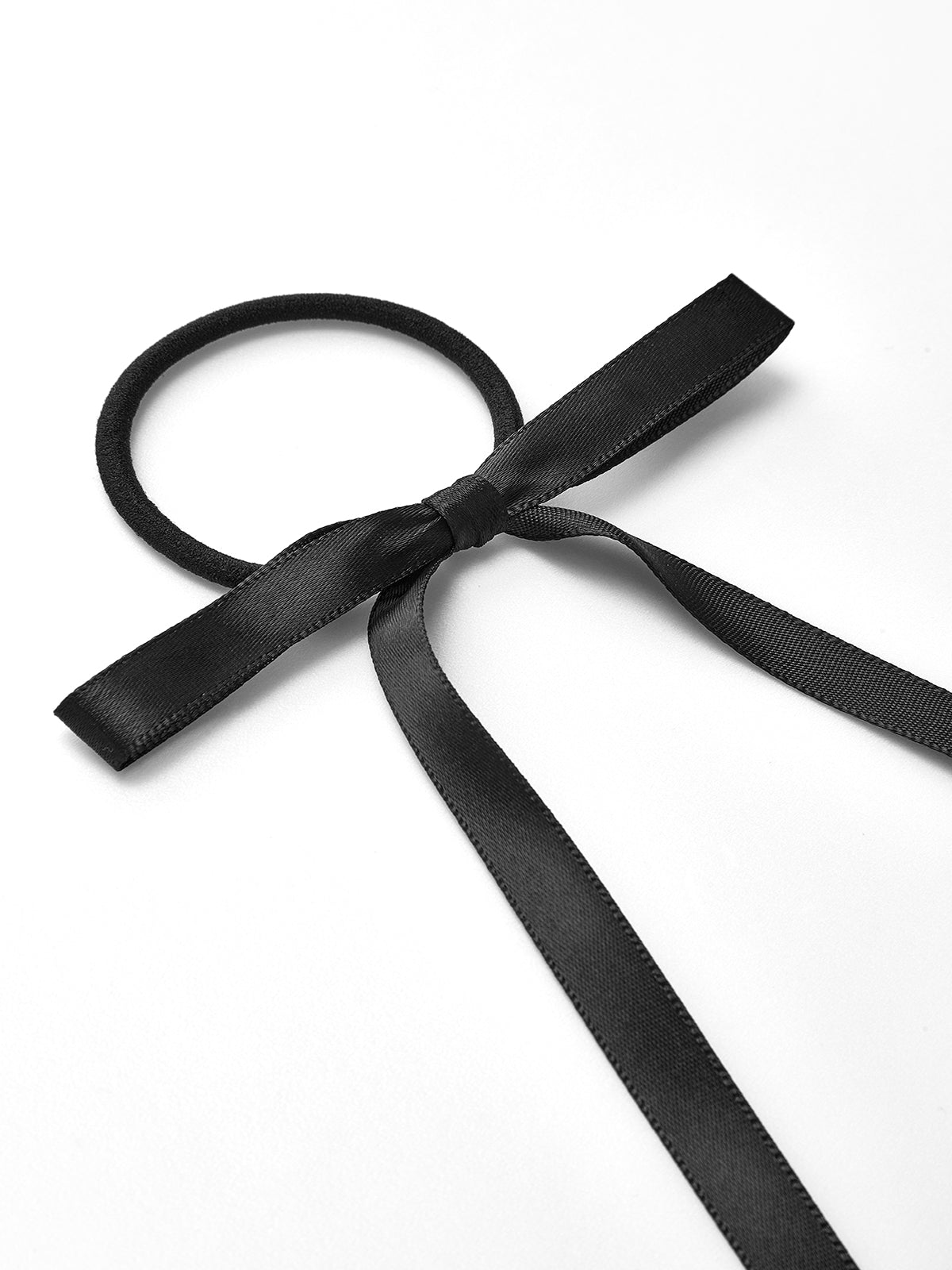 Minimalistisk håraccessoar med rosett