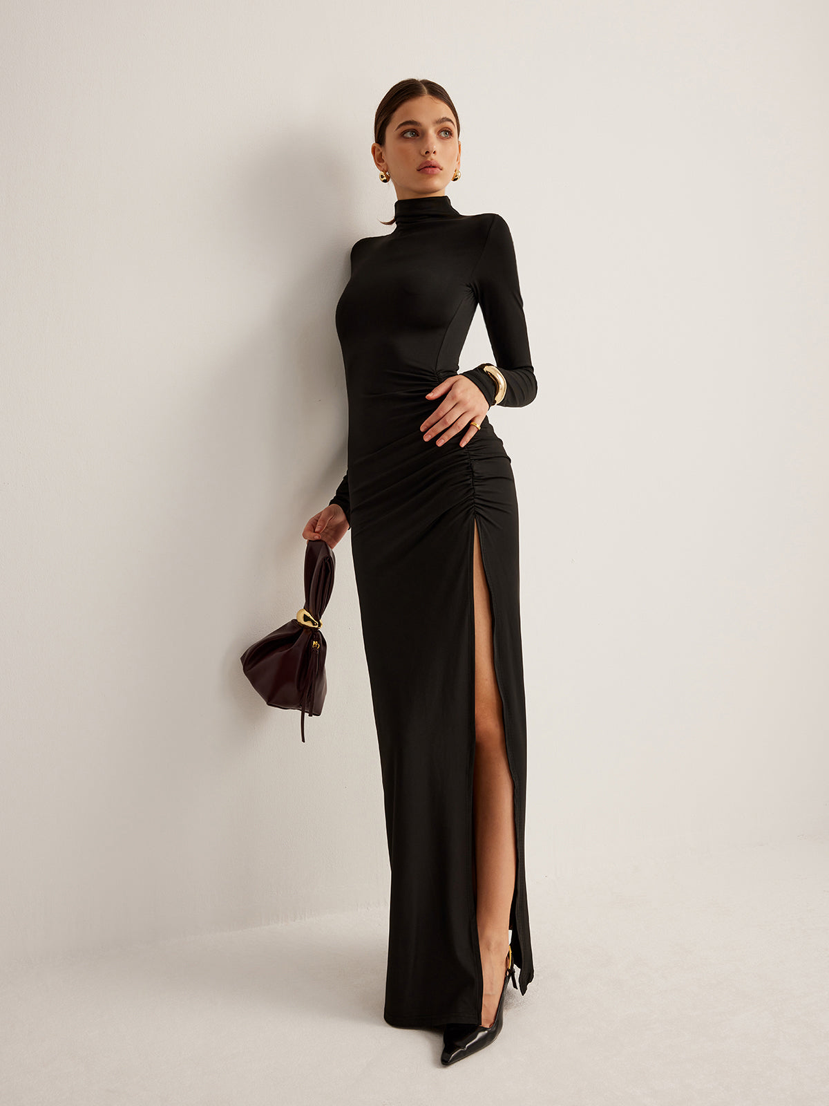 Jerseykleid mit Stehkragen, Plissee und Schlitz
