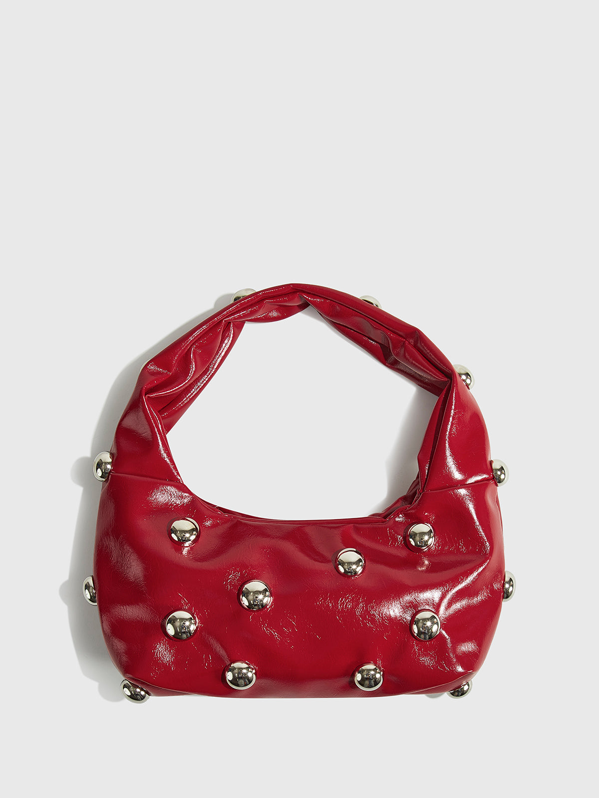 Abgerundete Achseltasche mit Nieten