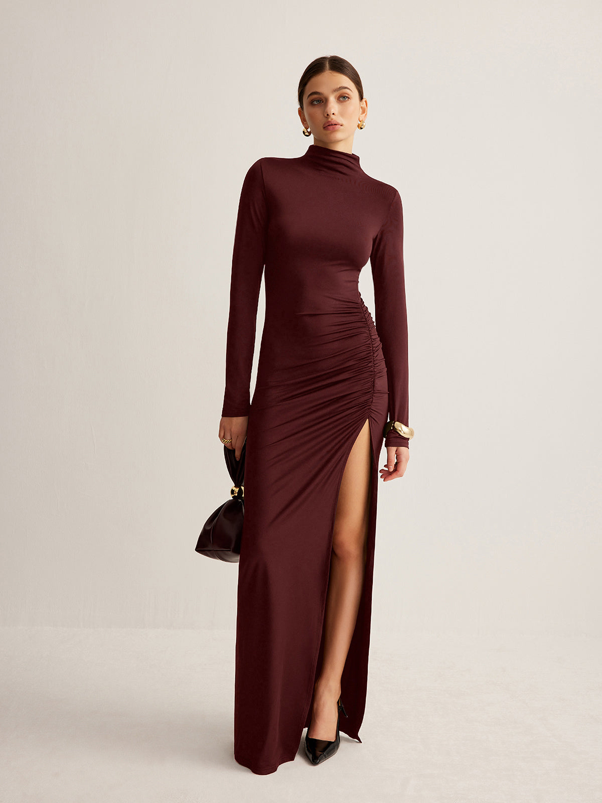 Jerseykleid mit Stehkragen, Plissee und Schlitz