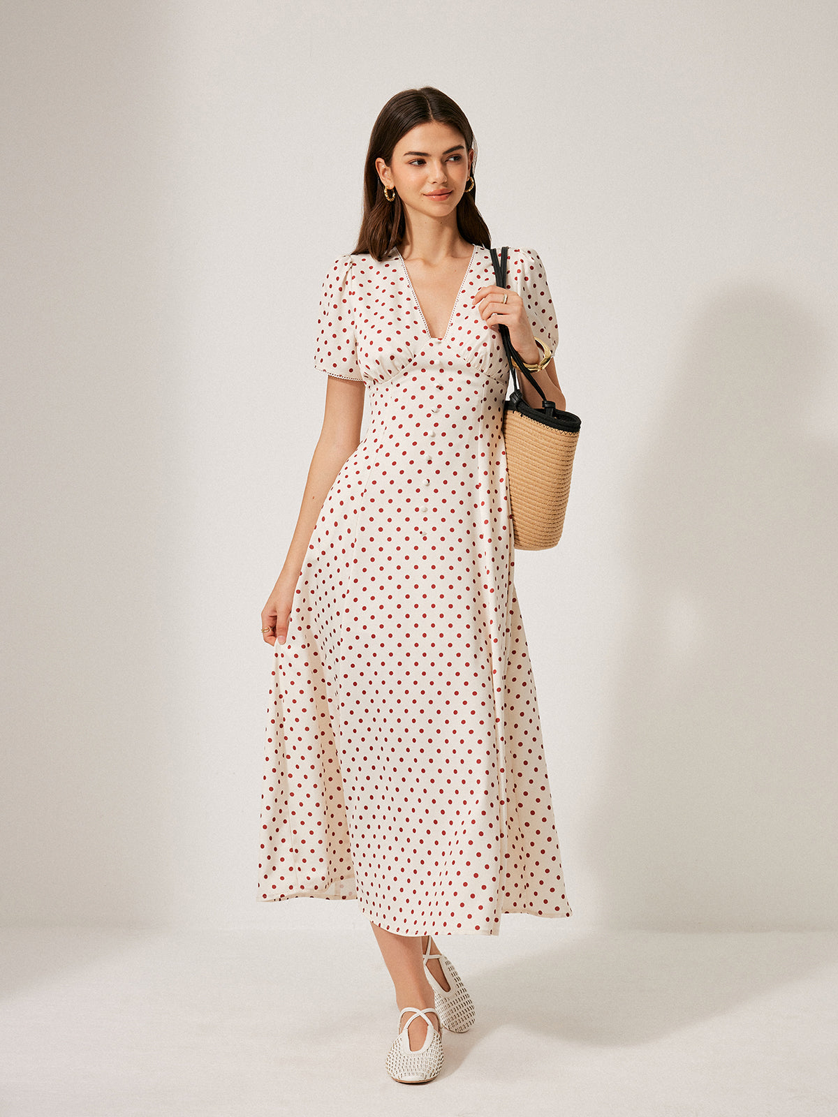 Kleid mit Puffärmeln und Punkten