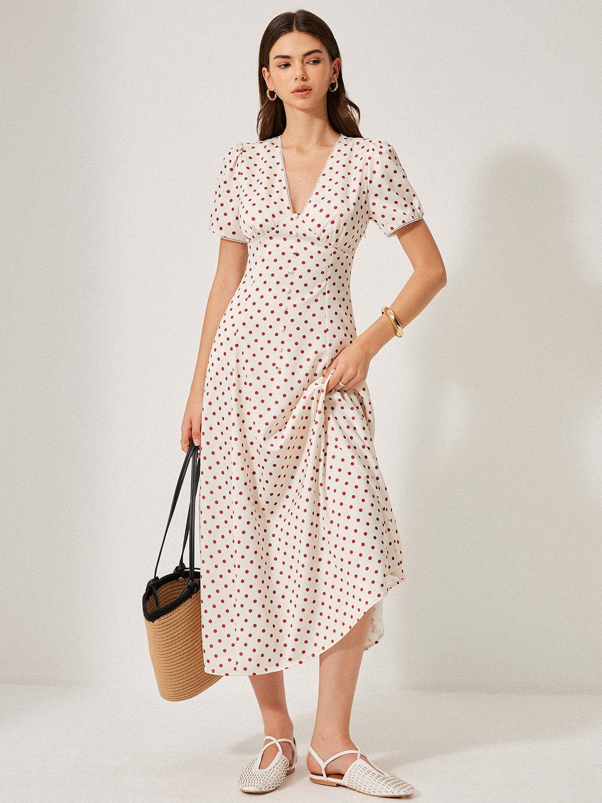 Kleid mit Puffärmeln und Punkten