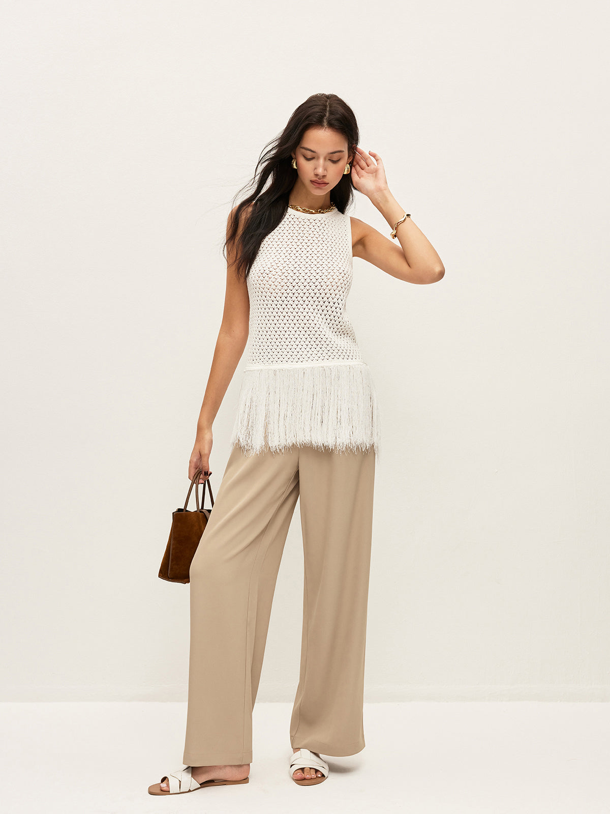Halbtransparente Strickweste mit Fransensaum