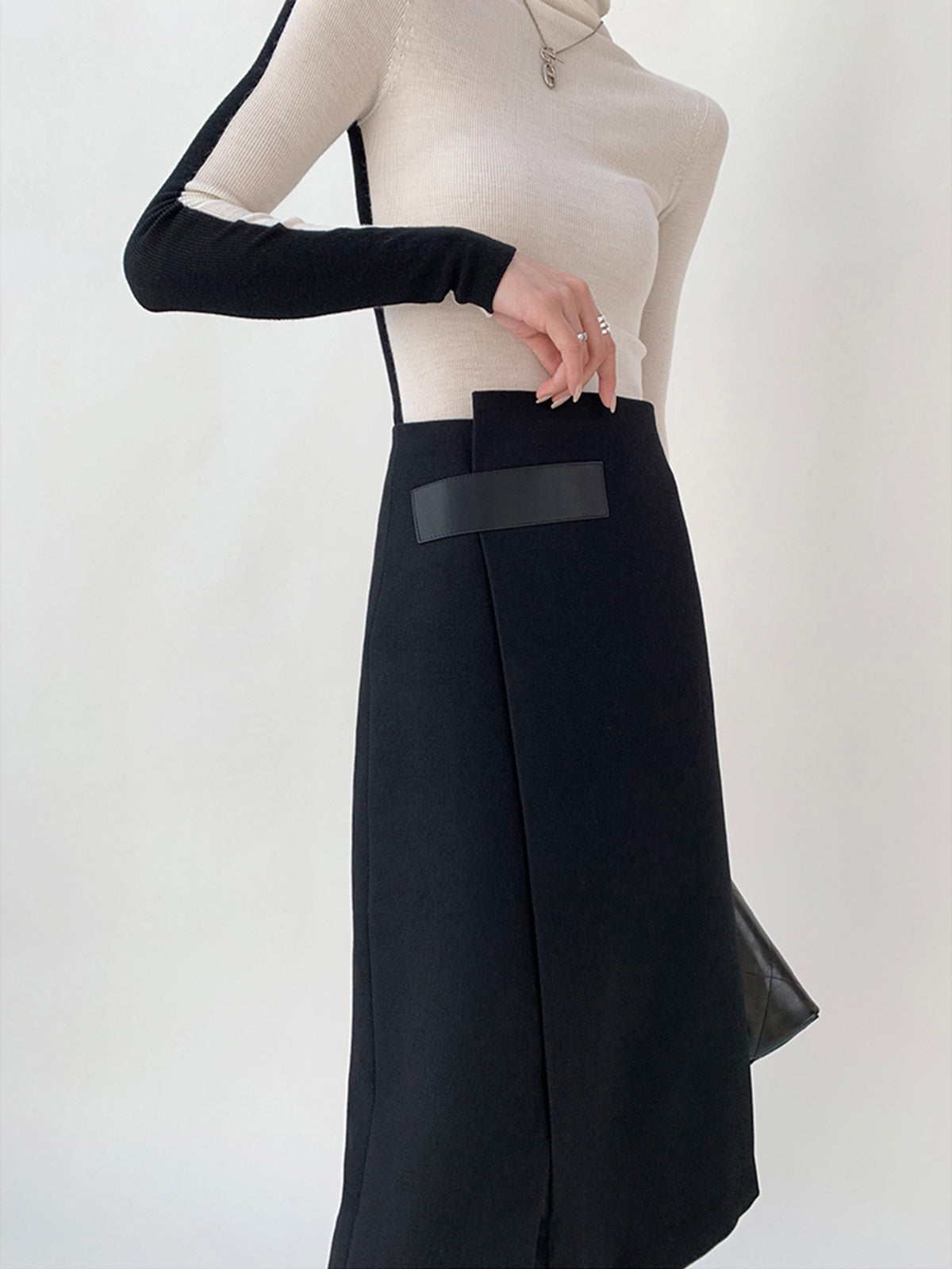 Asymmetrisk midikjol i tweed med hög midja