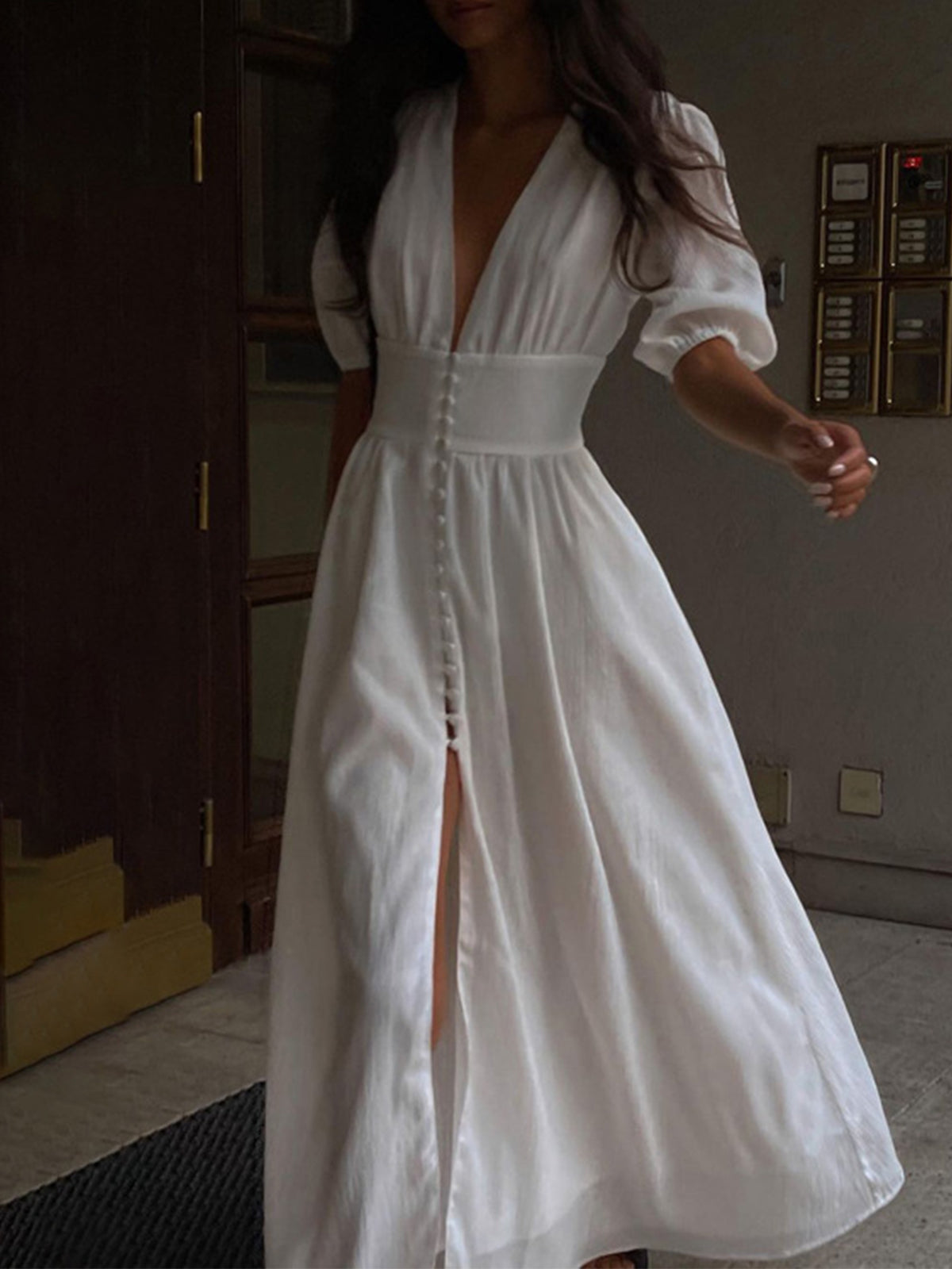 Langes Kleid mit französischem Knopfschlitz 