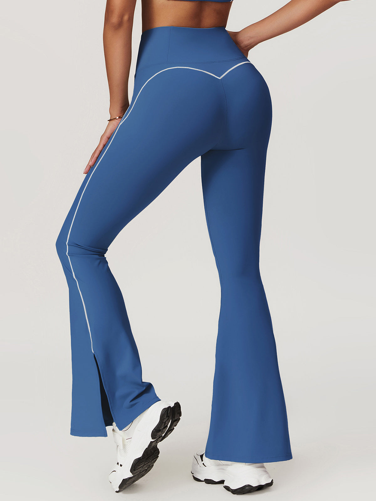 Högmidjade höftlyftande utsvängda leggings