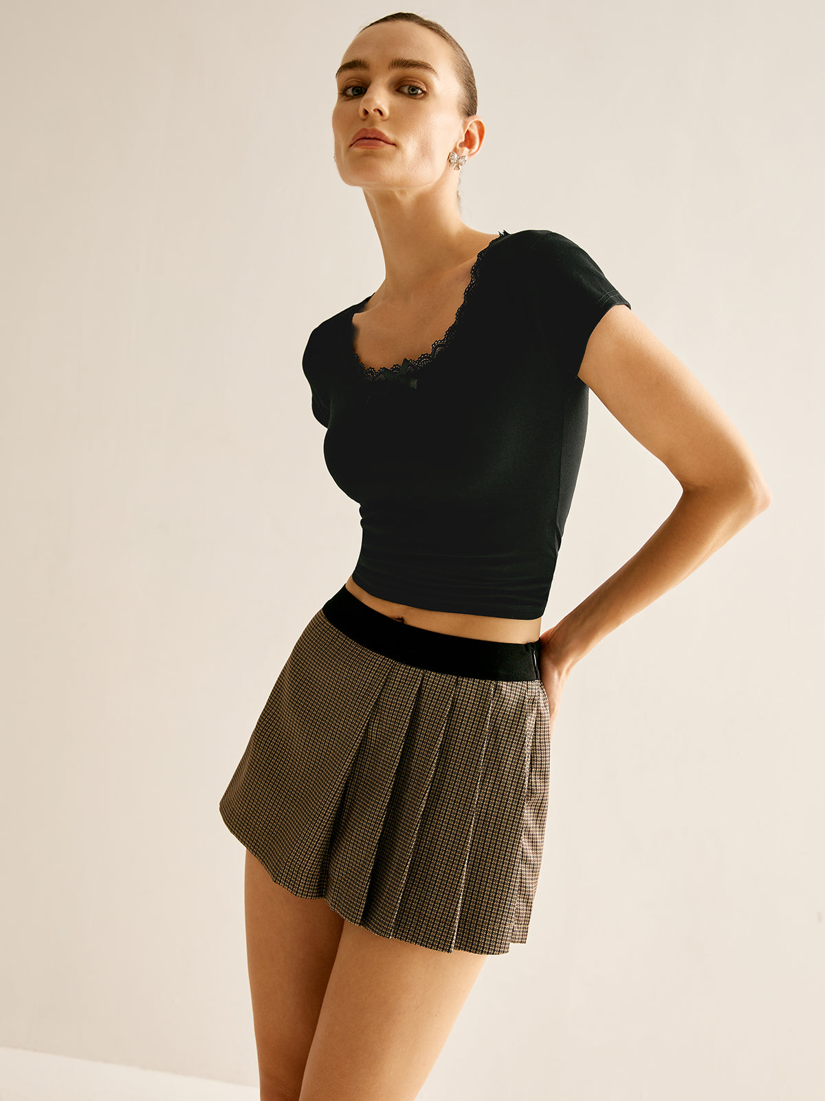 Shorts mit Patchwork-Karomuster und Falten 