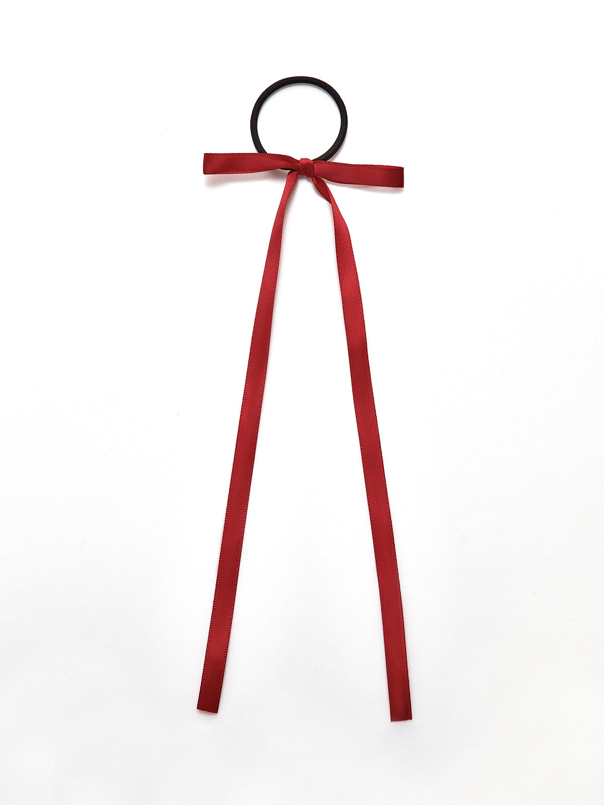 Minimalistisk håraccessoar med rosett 