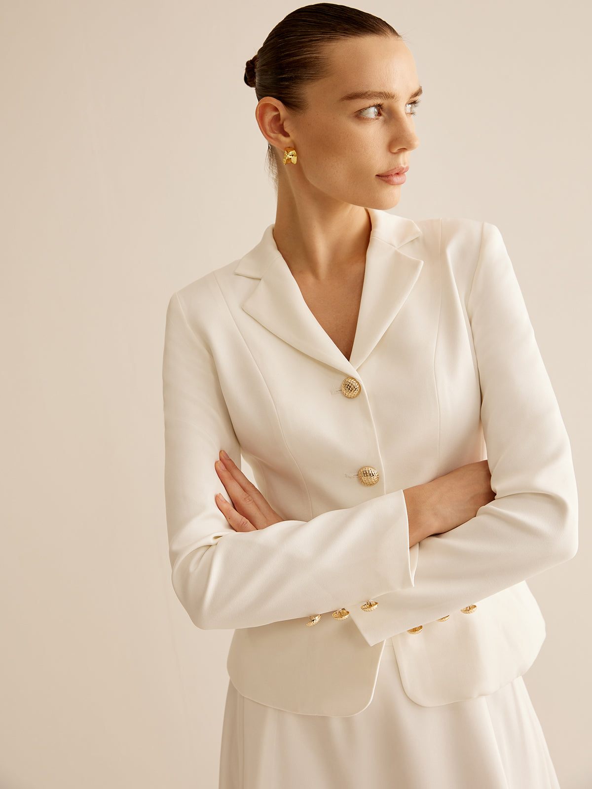 Elegant kavaj med metallknappar 