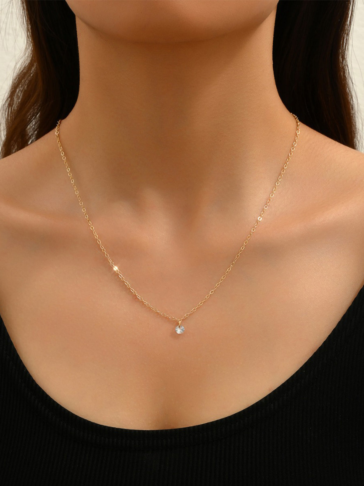 Halsband med tofsar och strass