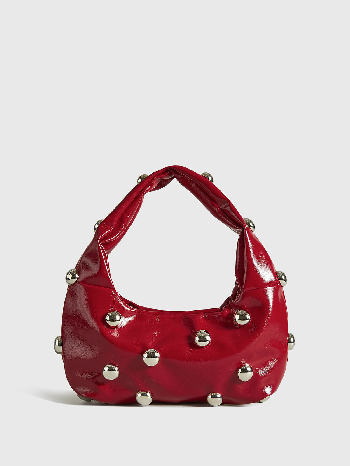 Abgerundete Achseltasche mit Nieten 