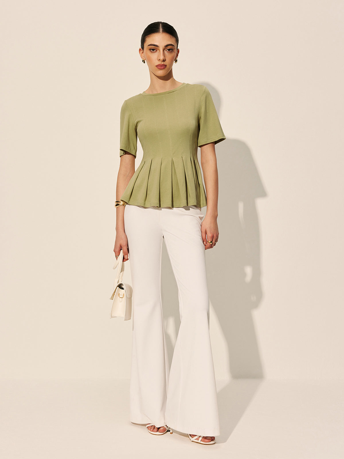 Plisserad Peplum Ribbad Topp 