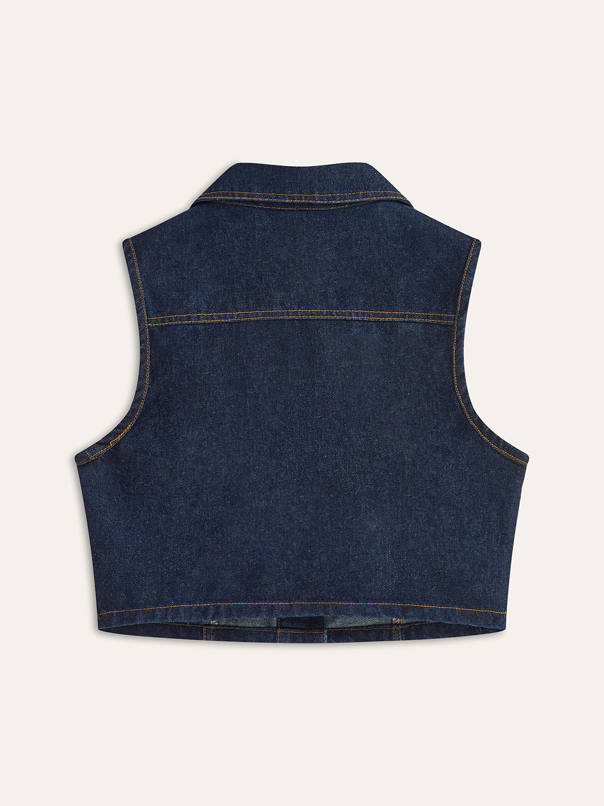 Ärmlös väst med knappar i denim 