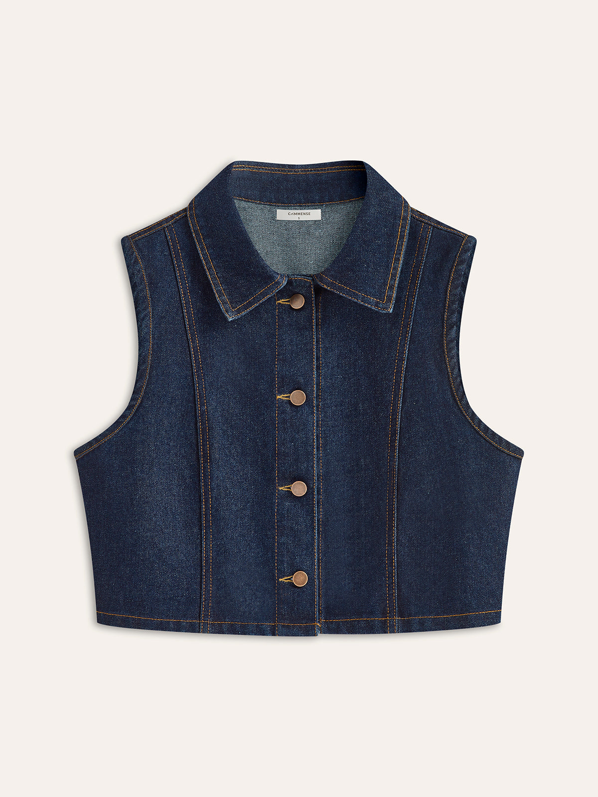 Ärmlös väst med knappar i denim 