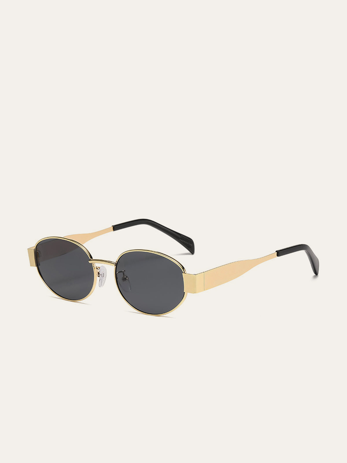Ovale Sonnenbrille mit Goldbesatz 